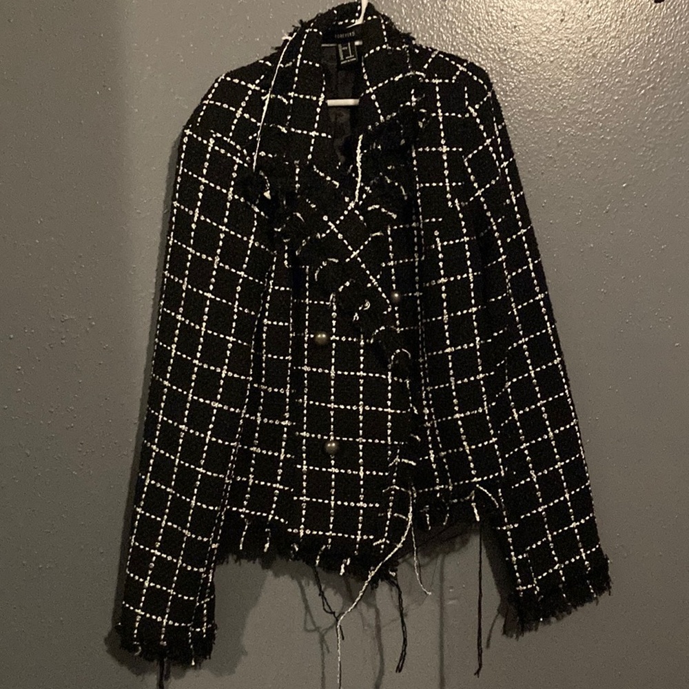 Small, sort of blazer, I am regularly a Medium but this fit well.
